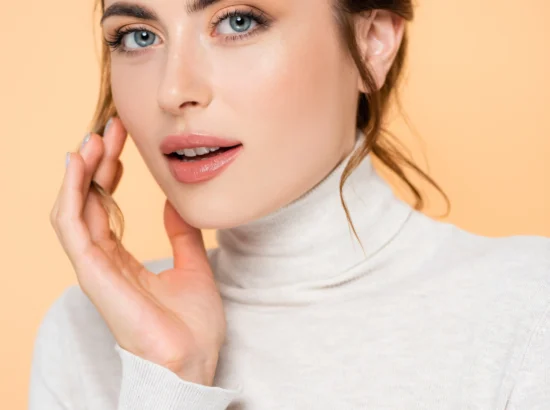 young-woman-in-turtleneck-looking-at-camera-while-2026-03-11-06-51-21-utc copy